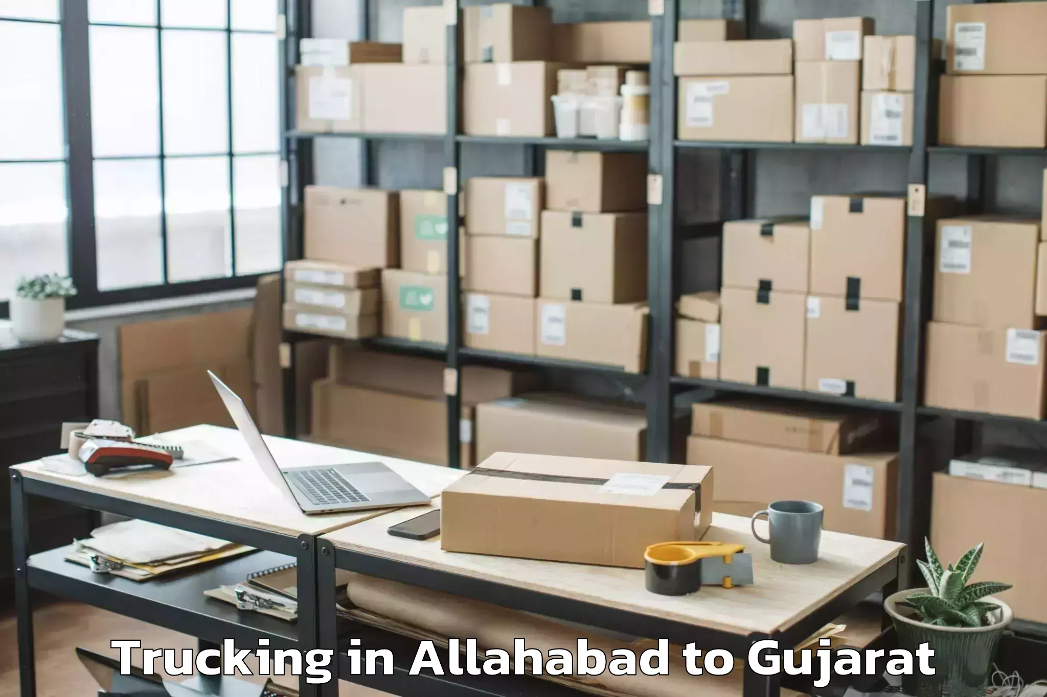 Easy Allahabad to Lodhika Trucking Booking